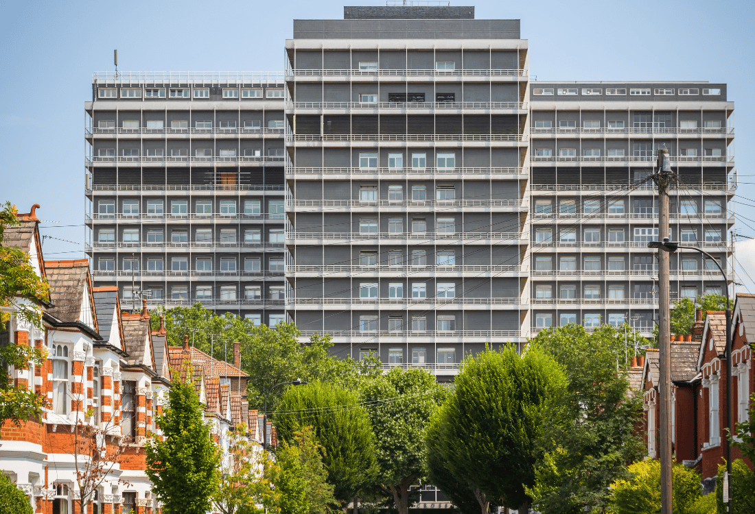 Charing Cross Hospital in Hammersmith London seen from a terraced street.