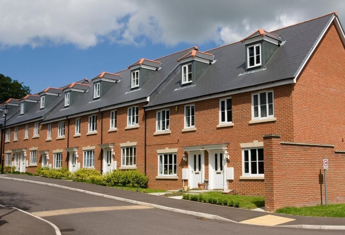 A row of well maintained new build houses.