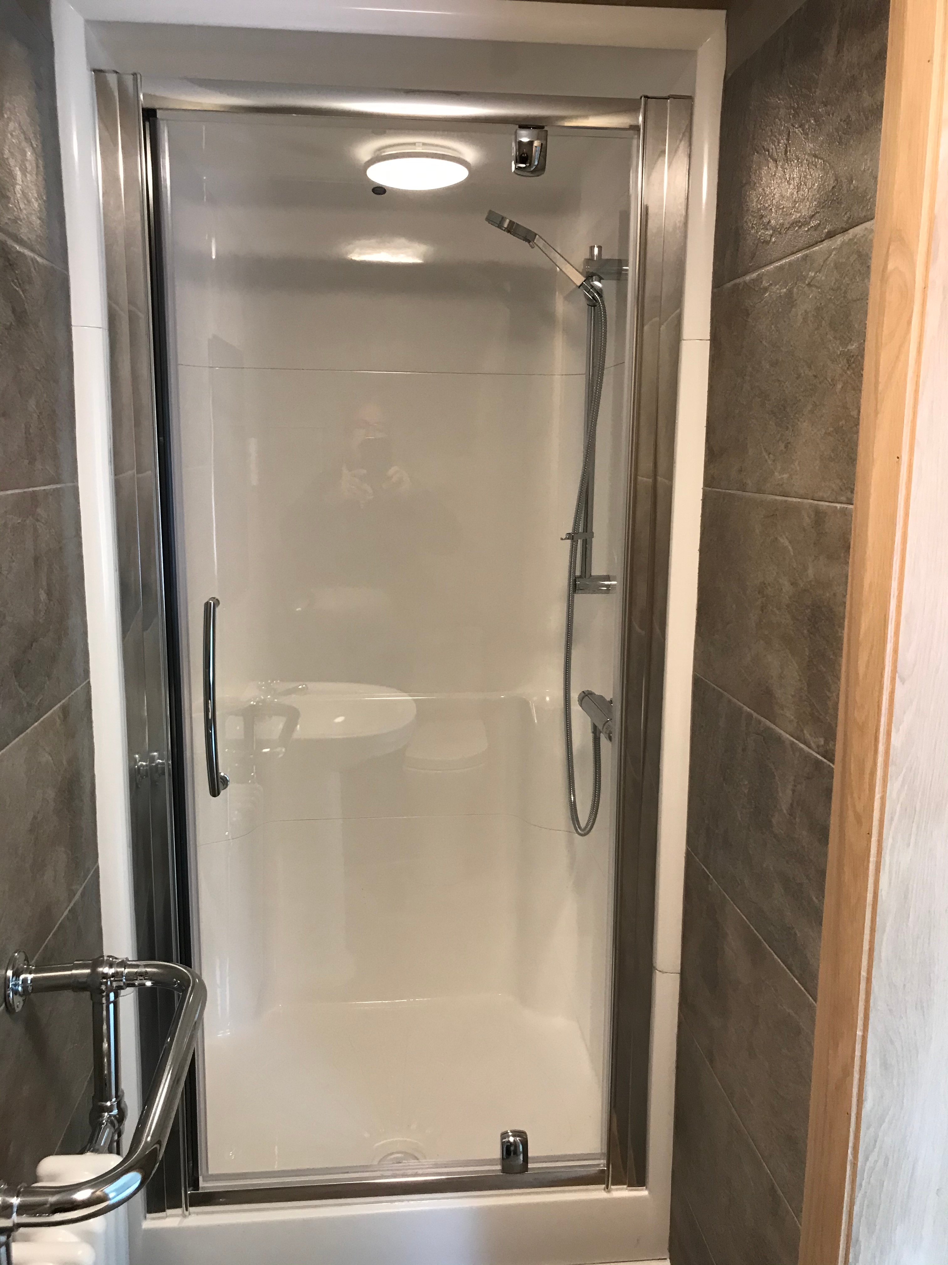 A compact shower room designed to maximise available space while maintaining a modern and practical layout.