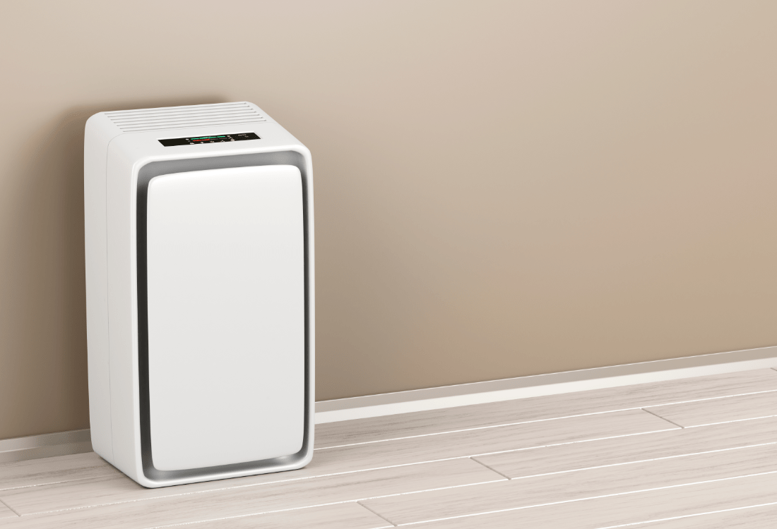 Dehumidifier against the wall in a bathroom preventing damp and mould