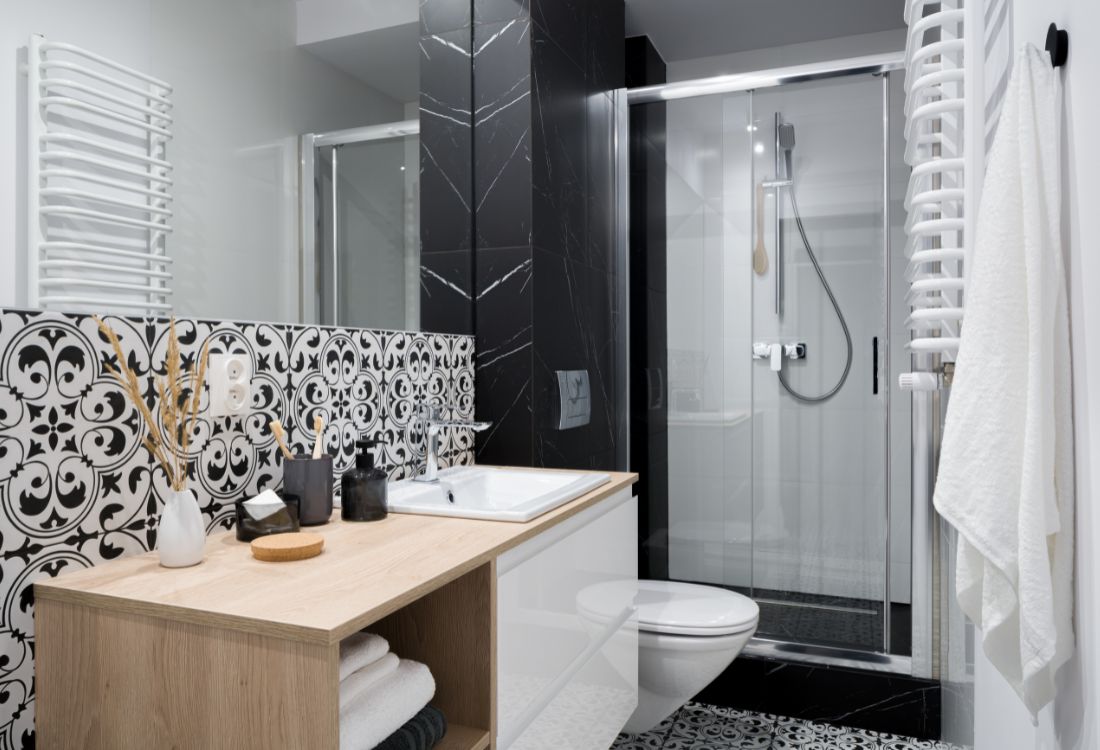 An Airbnb guesthouse bathroom upgraded with a stylish shower pod.