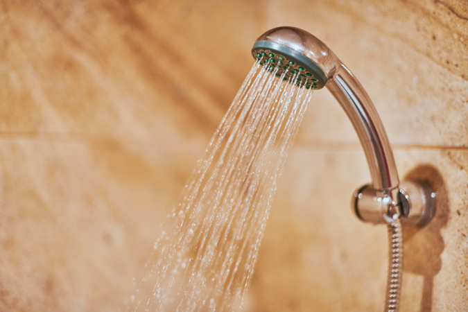 A working shower head that's saving the user money on their water bill.